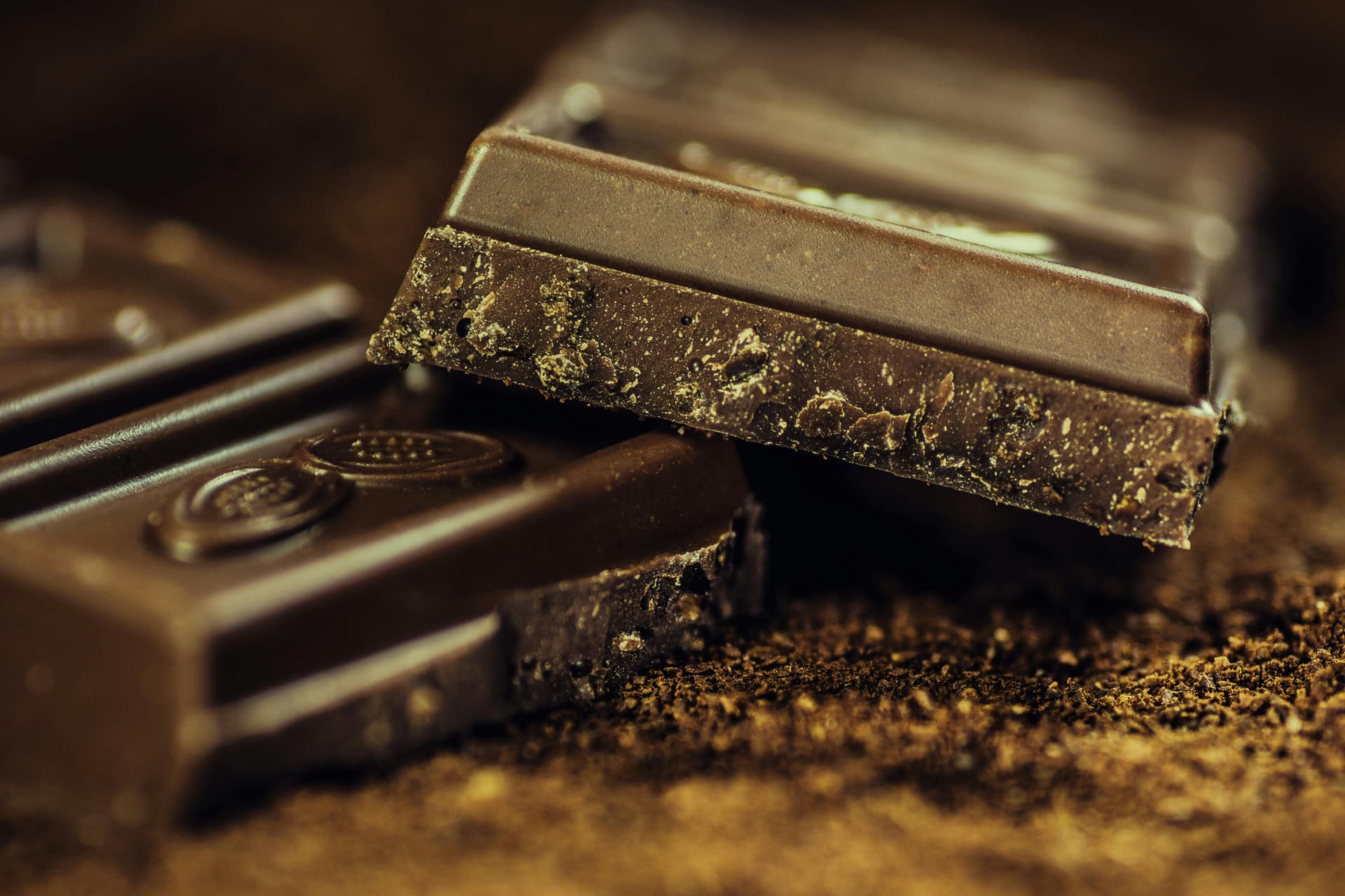 Artisan chocolate bars wrapped in elegant paper packaging